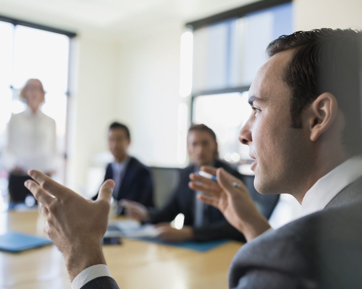 close-up-businessman-gesturing-in-conference-room-meeting-598522885-57606fa85f9b58f22ef5afa1